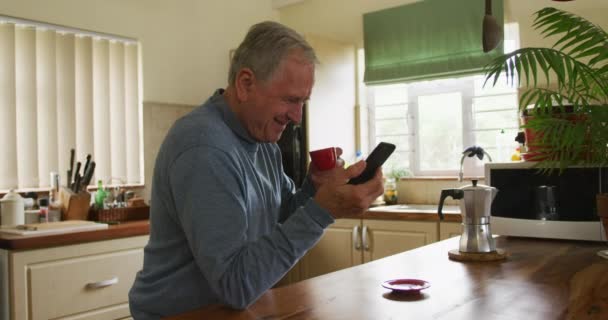 Side View Senior Caucasian Man Relaxing Home Sitting Counter His — 비디오