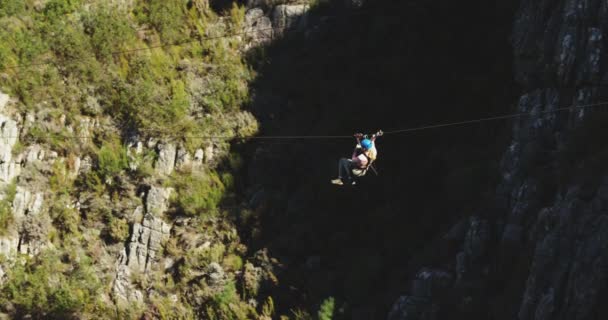 Rear View Caucasian Woman Zip Lining Sunny Day Mountains Slow — Stock Video