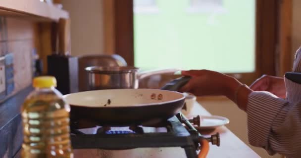 Side View Mid Section Young Mixed Race Woman Cooking Bacon — 图库视频影像