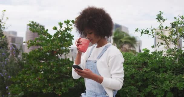 Side View Young Mixed Race Woman Afro Hair Standing Roof — Stockvideo