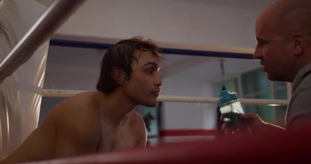 Side View Close Mixed Race Male Boxer Drinking Water Gave — 비디오