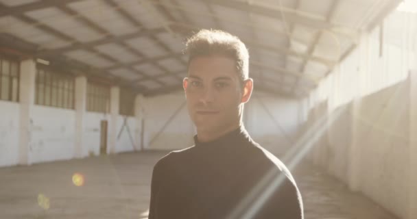 Portrait Happy Caucasian Male Dancer Empty Warehouse Looking Camera Cool — 비디오