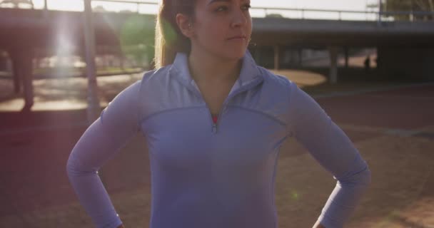 Front View Close Young Caucasian Woman Wearing Sports Clothes Looking — Stock Video