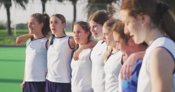 Side View Teenage Caucasian Female Hockey Team Standing Pitch Sports — Stock Video