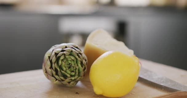 Close Cooking Ingredients Including Artichoke Lemon Italian Cheese Wooden Cooking — Stock Video