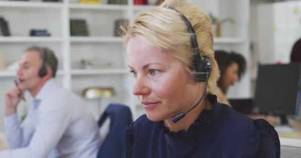 Side View Caucasian Businesswoman Working Modern Office Wearing Phone Headset — Stock Video