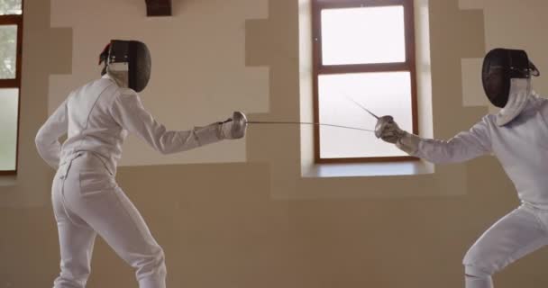 Side View Caucasian Mixed Race Male Fencer Athletes Fencing Training — Stock Video