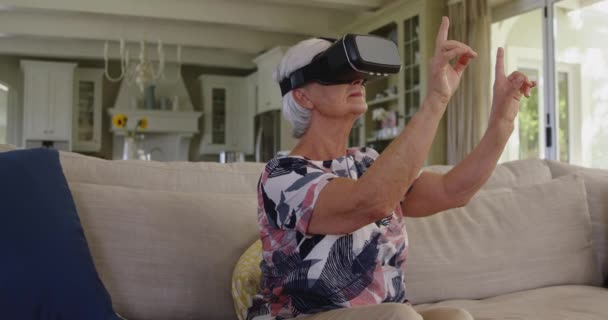 Side View Senior Caucasian Woman Sitting Sofa Living Room Wearing — Stock Video