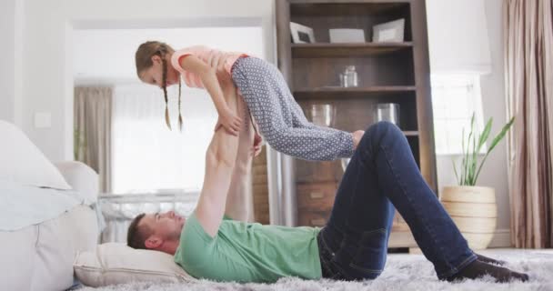 Side View Caucasian Man Enjoying His Time Apartment Lying Floor — Stock Video