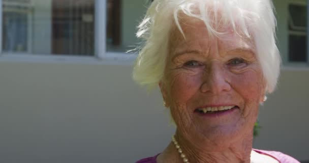 Portrait Happy Senior Caucasian Woman Sitting Park Retirement Home Smiling — Stock Video