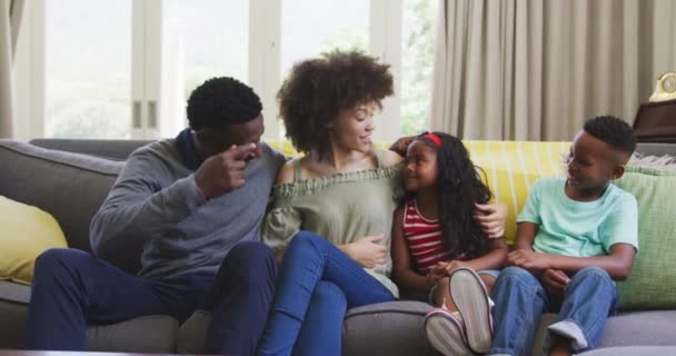 Mixed Race Family Enjoying Time Home Sitting Couch Interacting Smiling — Stock Video