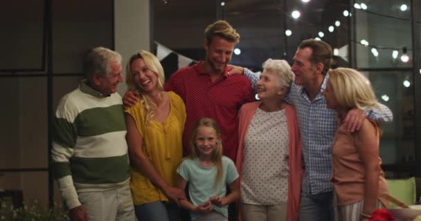 Multi Generation Caucasian Family Enjoying Time Home Standing Together Talking — Stock Video