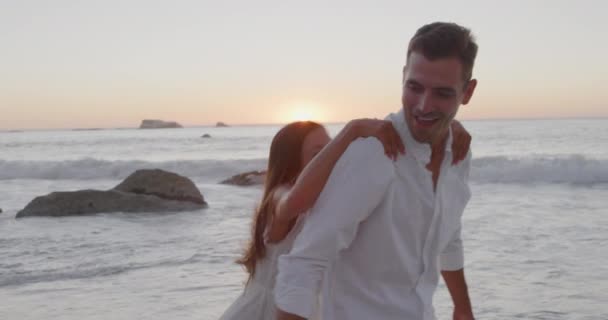 Side View Happy Young Adult Caucasian Couple Relaxing Sea Sunset — Stock Video