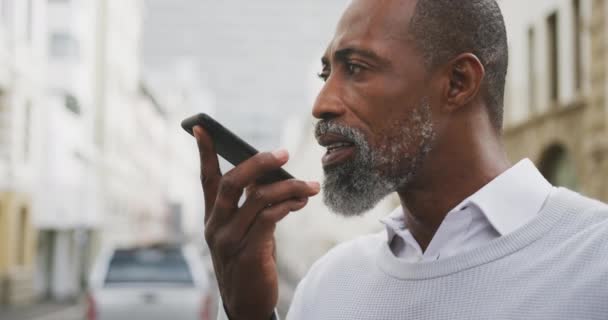 African American Man Out City Streets Day Standing Street Using — Stock Video