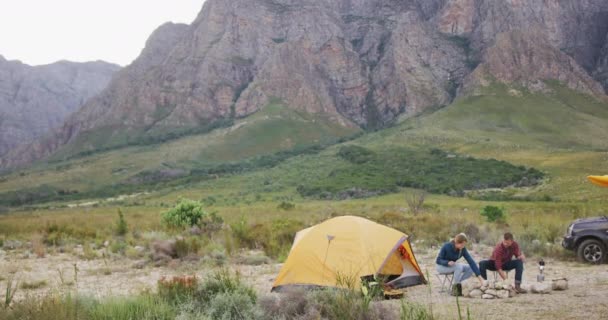 Caucasian Couple Having Good Time Trip Mountains Sitting Campfire Talking — Stock Video