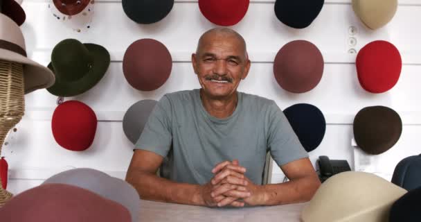 Portrait Senior Mixed Race Man Moustache Sitting Smiling Camera Showroom — Stock Video