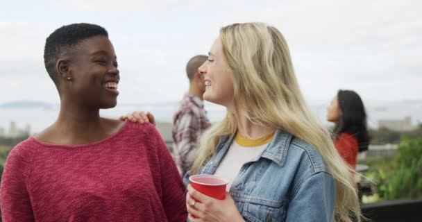 Caucasian Mixed Race Women Hanging Out Roof Terrace Together Cloudy — Stock Video