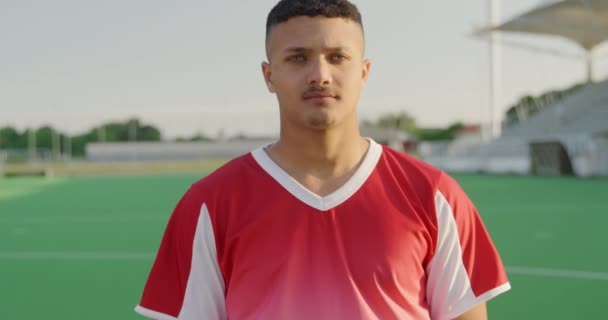 Portrait Close Mixed Race Male Field Hockey Player Wearing Red — Stock Video
