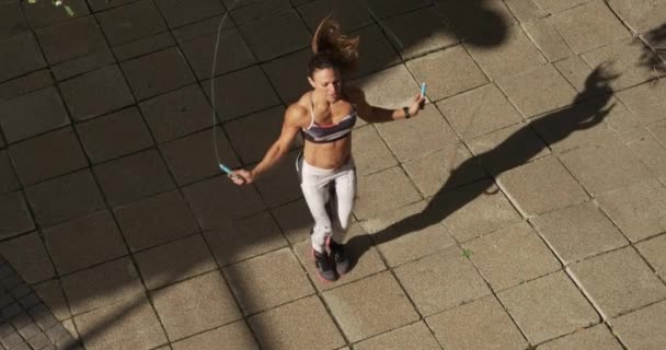 Sporty Caucasian Woman Long Dark Hair Exercising Outdoor Daytime Using — Stock Video