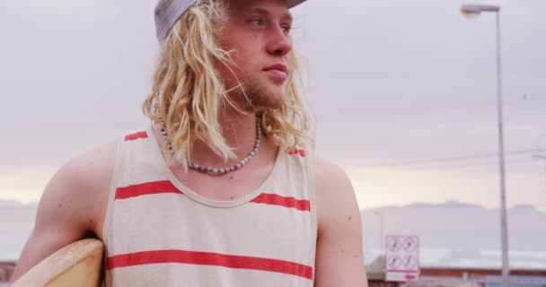 Caucasian Male Surfer Long Blond Hair Wearing Full Cap Casual — Stock Video
