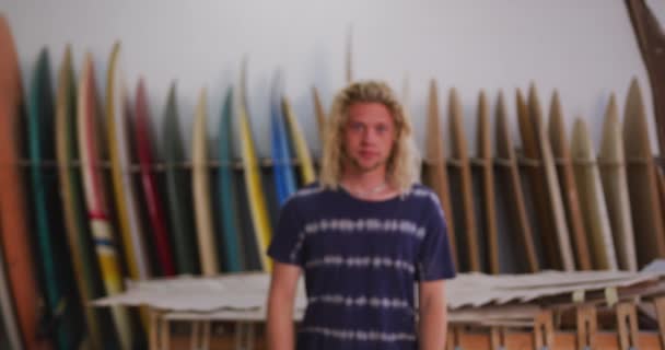 Portrait Caucasian Male Surfboard Maker His Studio Surfboards Rack Background — Stock Video