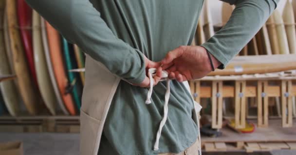 Male Surfboard Maker His Studio Putting Protective Apron Surfboards Rack — Stock Video