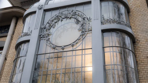 Window with beautiful round ornament made of metal