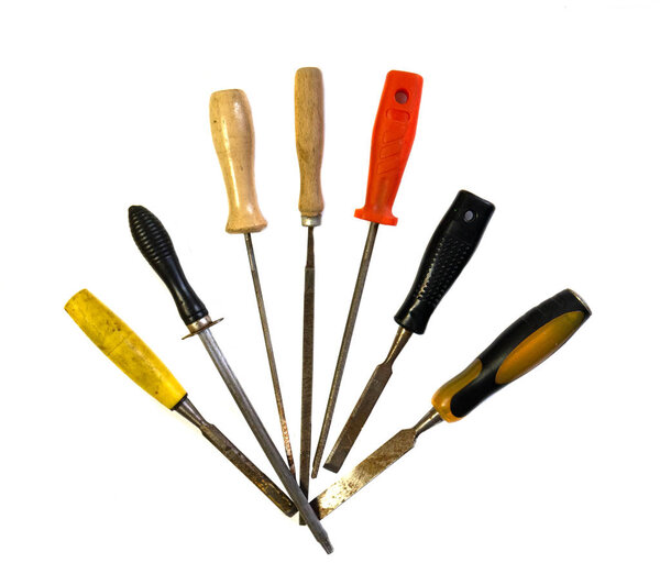 A set of different types of chisels and files. 