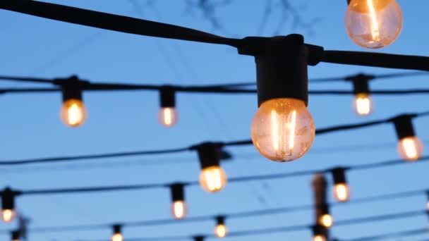 Lanterns Evening Background Sunset Dark Blue Sky Light Bulbs Background — Stock Video