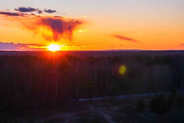 Foto van zonsondergang, heldere oranje hemel. — Stockfoto