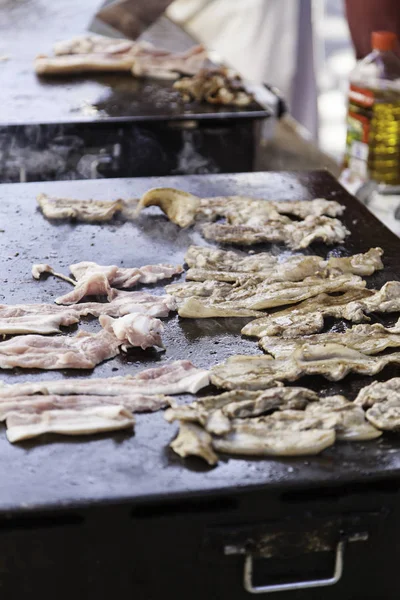 Bacon on the grill — Stock Photo, Image