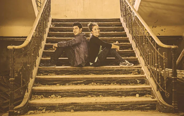 Couple on stairs — Stock Photo, Image