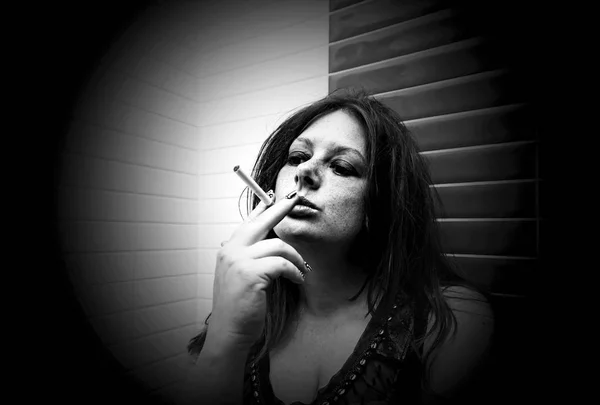 Woman smoking snuff — Stock Photo, Image