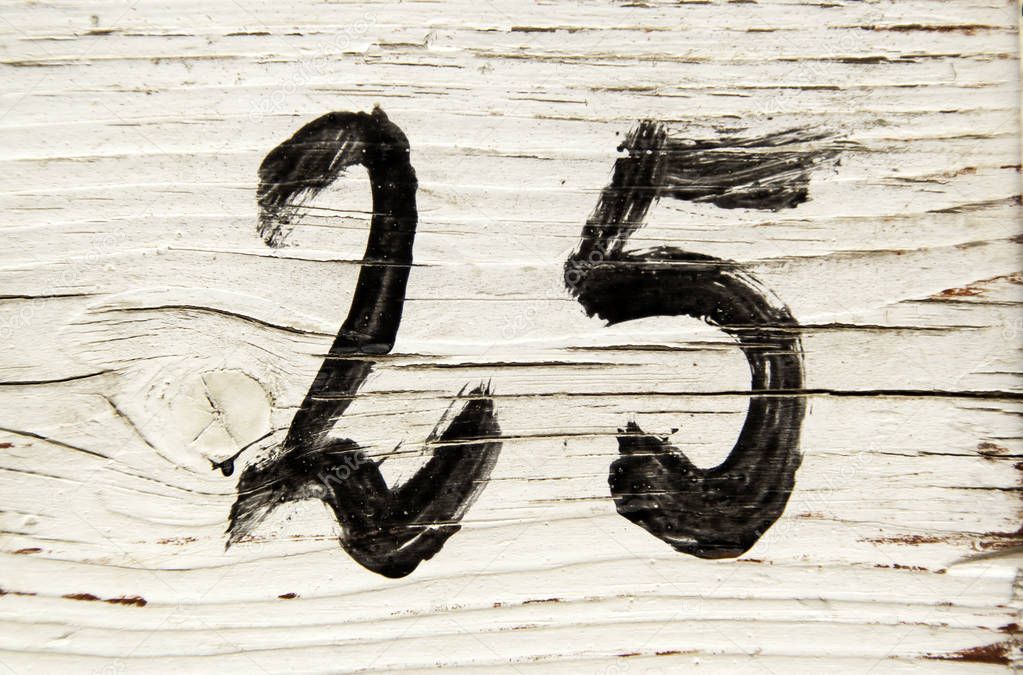 Number twenty-five in wood
