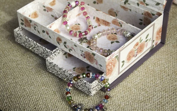 Bracelets in wooden box — Stock Photo, Image