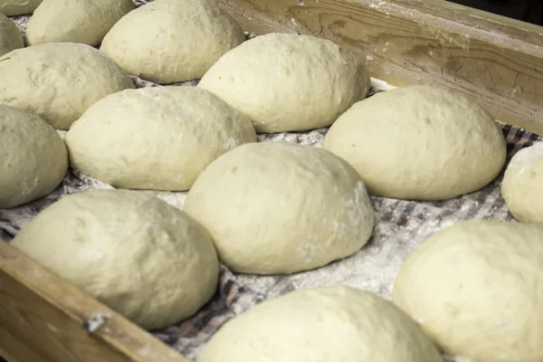 Man kneading bread