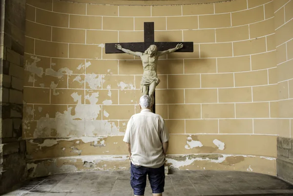 Man praying to jesus