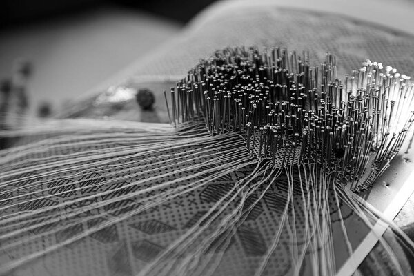 Woman sewing bobbins