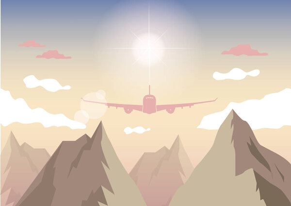 the plane in the sky over mountainous terrain