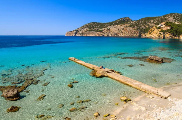 Jetty on beautiful beach in Camp de Mar, Majorca island, Spain