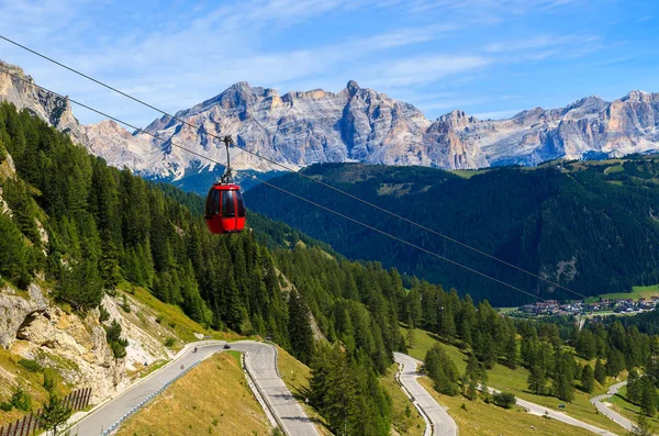Cable car lift to Passo Gardena in Dolomites Mountains, Italy