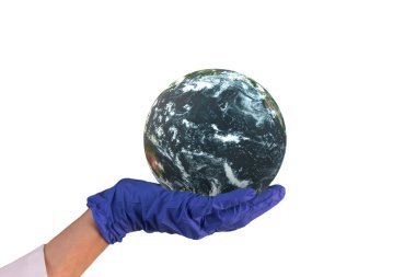 Gezegeni tutan mavi eldivenli insan eli. Bu görüntünün elementleri NASA tarafından döşenmiştir.