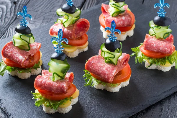 Canape on skewers with vegetables and sausage — Stock Photo, Image