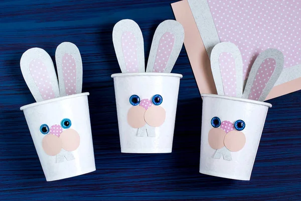 Homemade making of boxes for sweets in form of Easter hare. Step