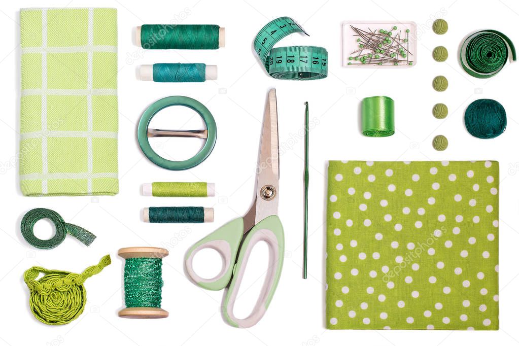 Various sewing accessories and tools green shades  