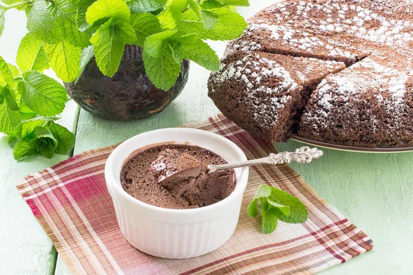 Homemade chocolate cake, chocolate dessert and mint — Stock Photo, Image