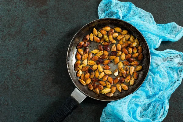 Pumpkin seeds fried with spices — Stock Photo, Image