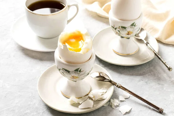 Breakfast. Soft-boiled eggs and cup of coffee