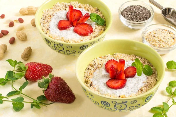 Chia pudding with coconut milk, strawberries and peanuts — Stock Photo, Image