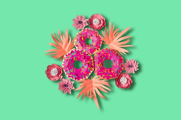 Donuts de papel rosa e folhas cor-de-rosa — Fotografia de Stock